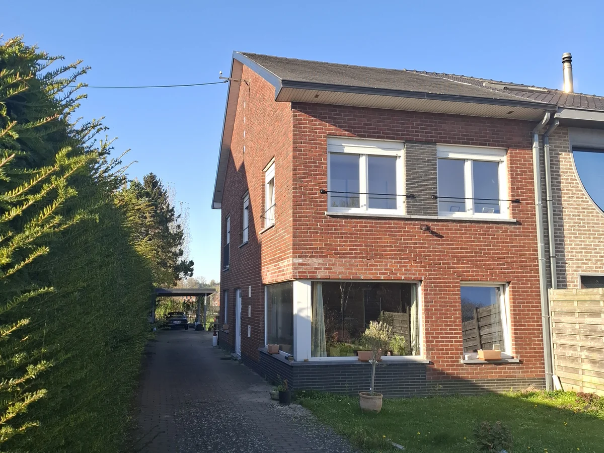 Brick house with renovated exterior carpentry