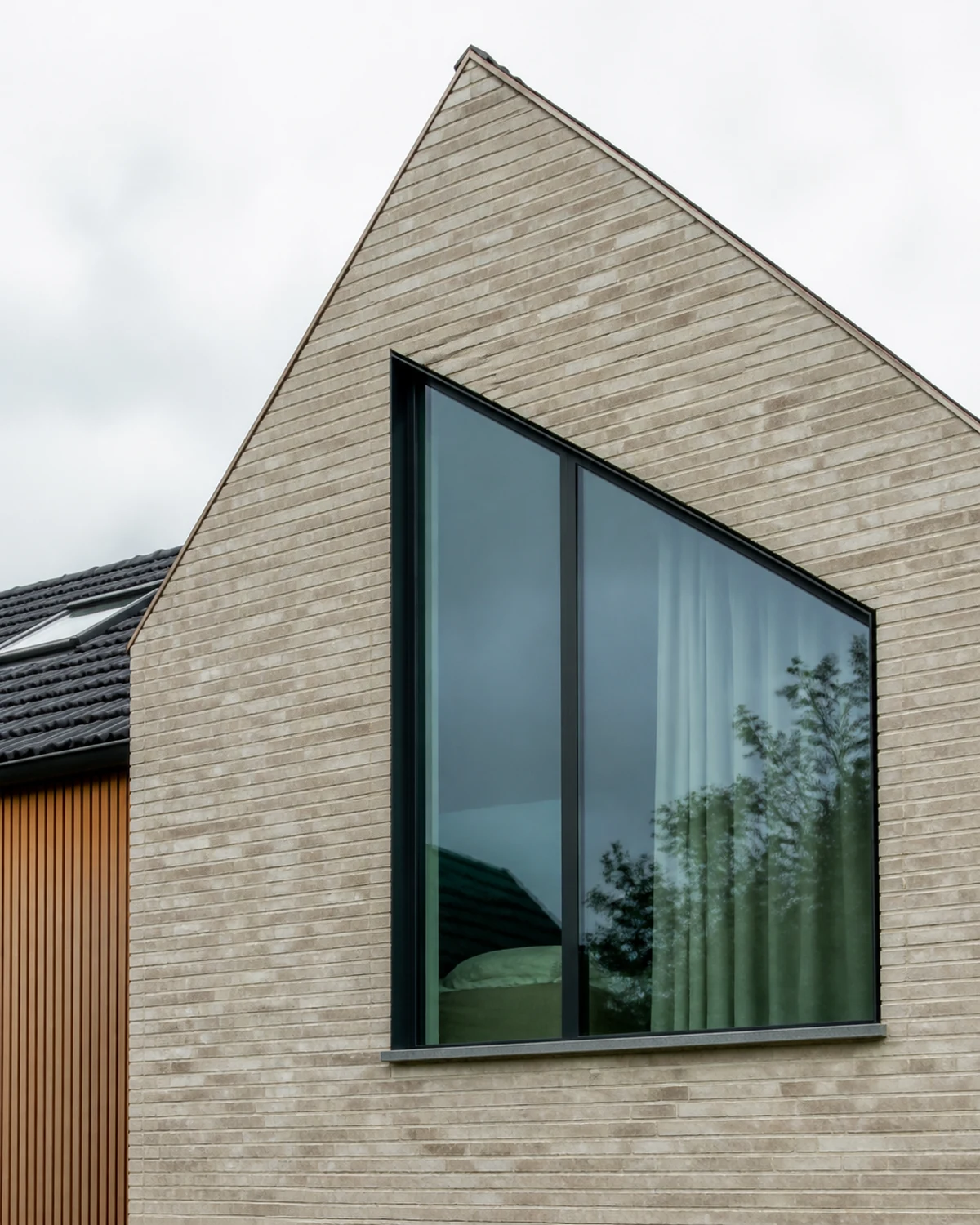 Specially shaped aluminum window in a modern facade