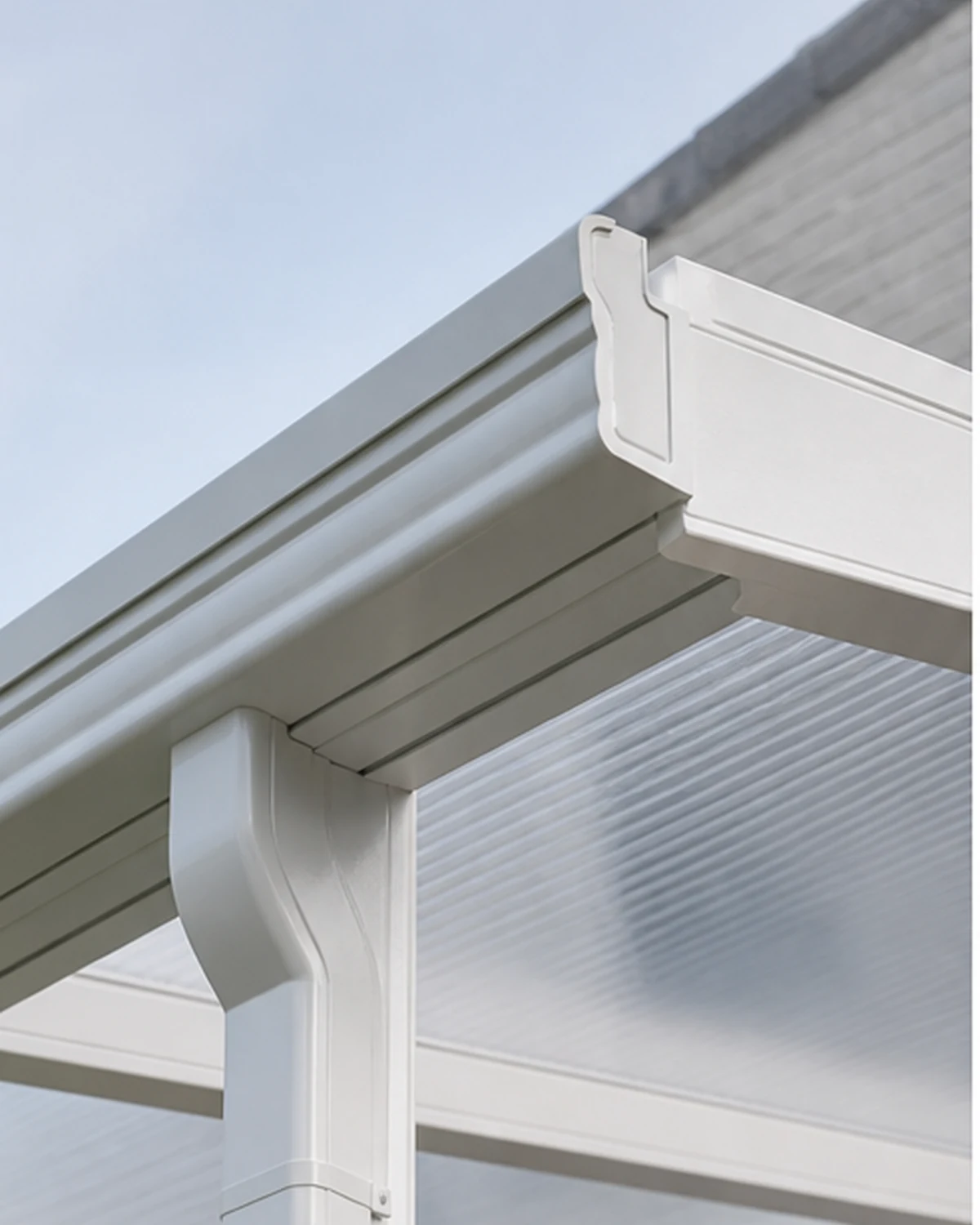 Detail of PVC roof beam, transparent sheet and integrated gutter